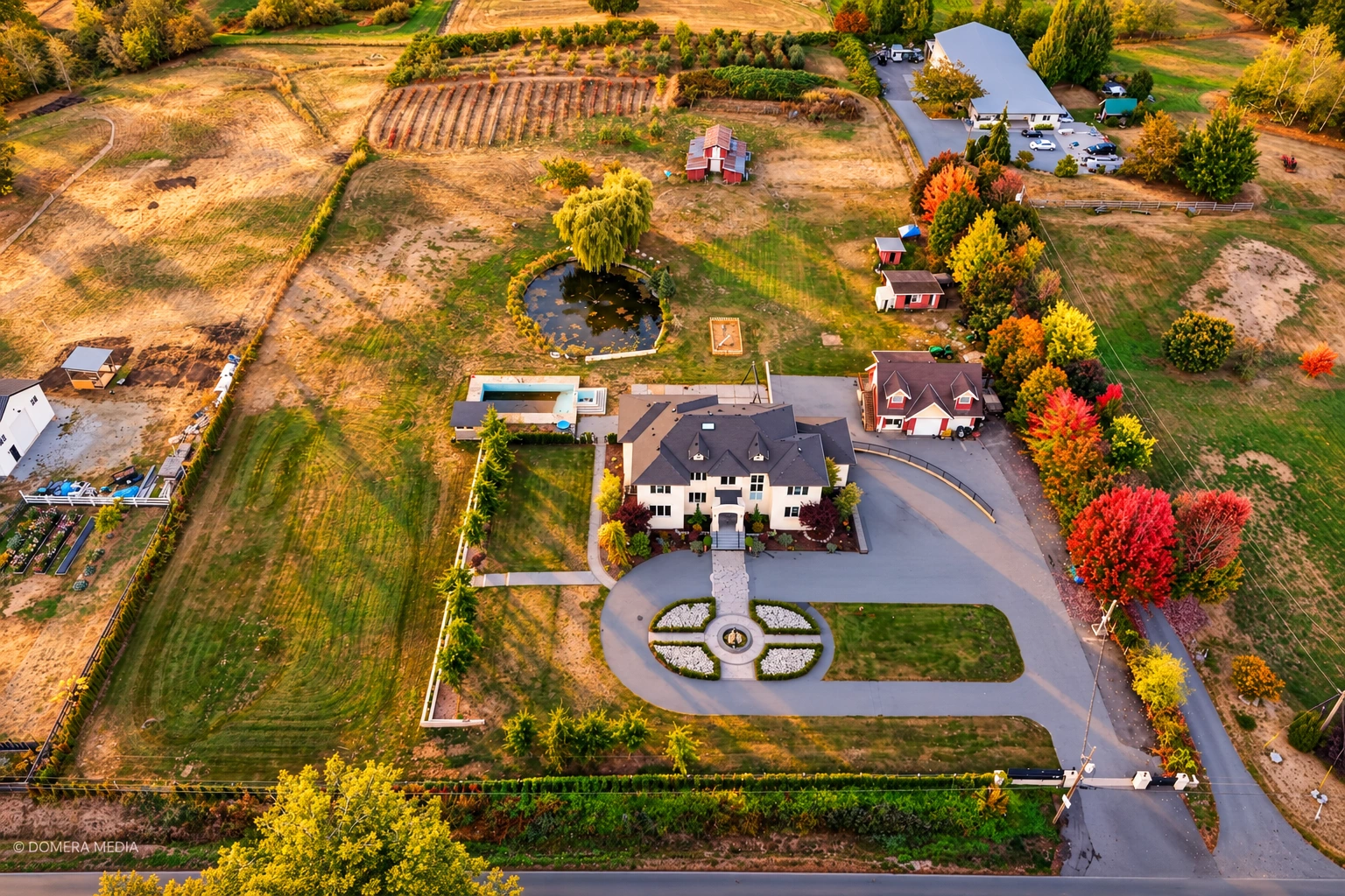 Aerial view of a country estate, gardens and surrounding fields
